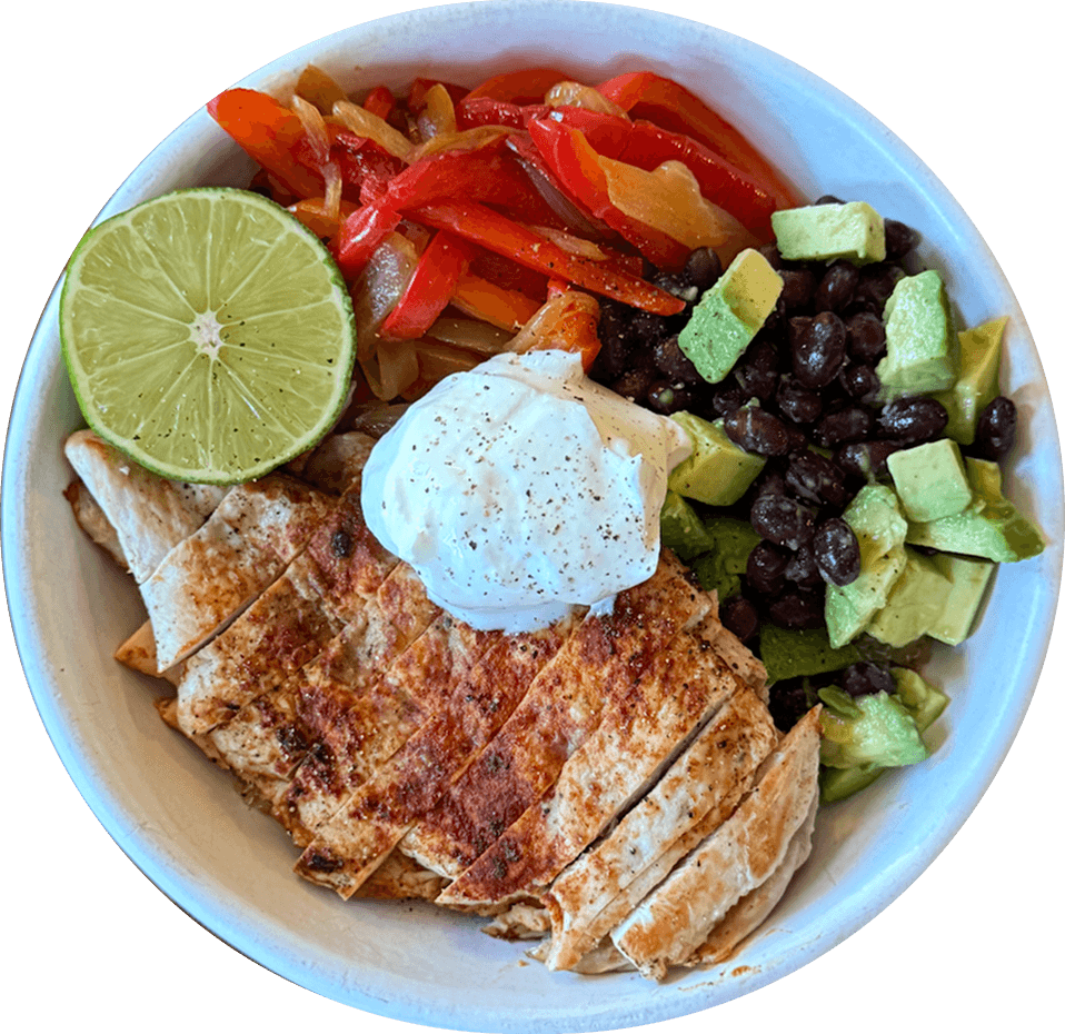 Chicken quinoa bowl with avocado and black beans